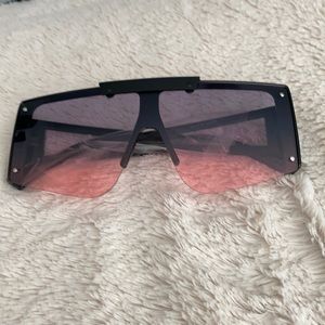Black and pink oversize glasses